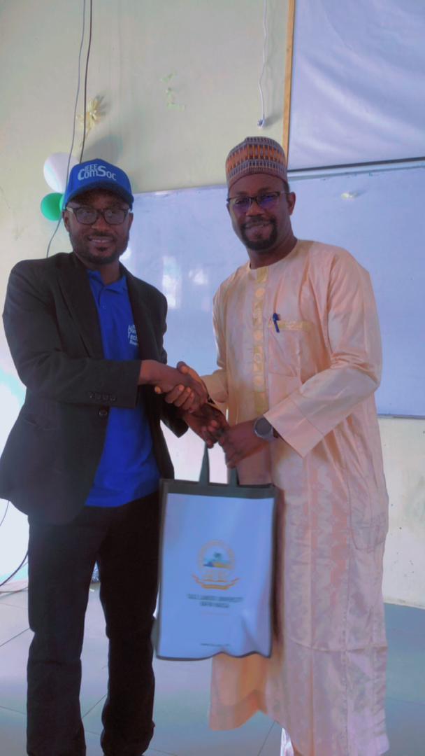 IEEE ComSoc handshake ceremony with Sule Lamido University gift bag (2024)