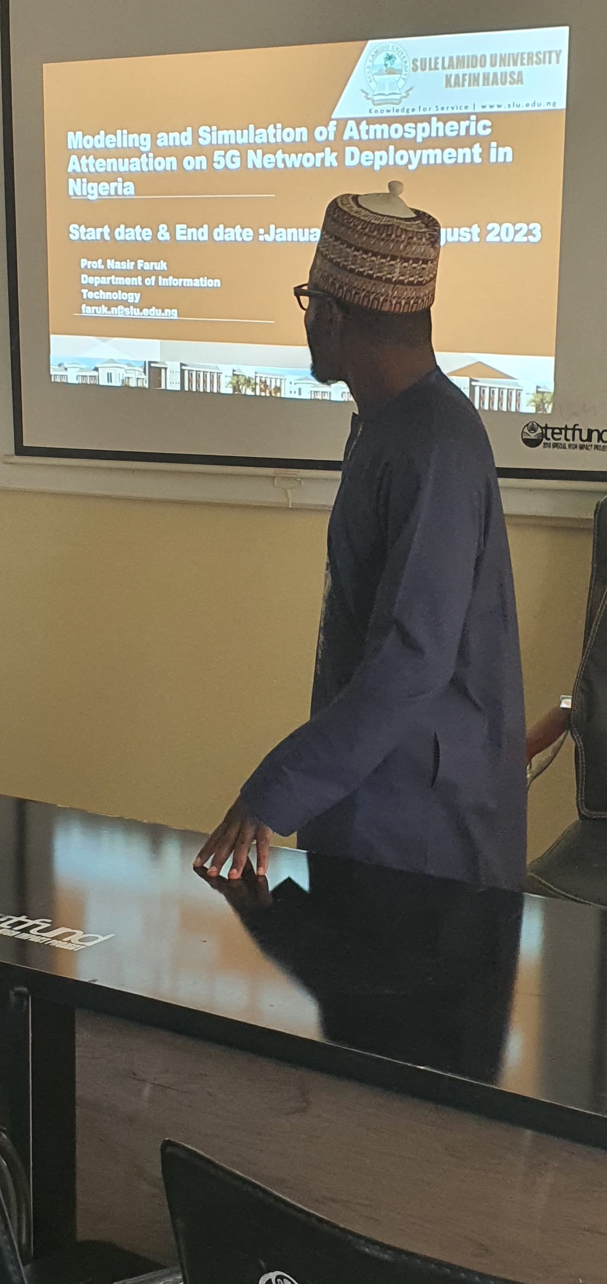 Prof. Nasir Faruk presenting 5G network research — Sule Lamido University (2025)