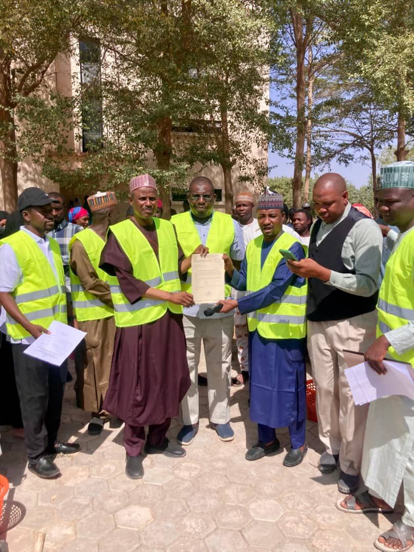 Faculty staff and students at a community outreach activity